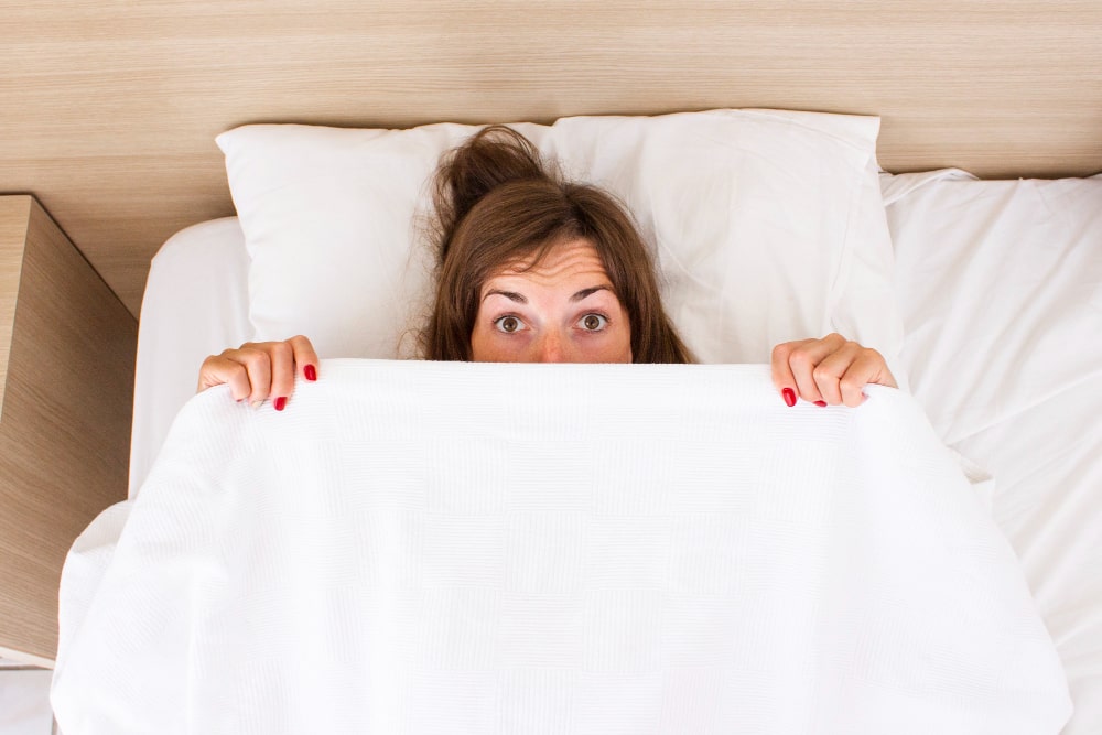 complexe féminin au lit