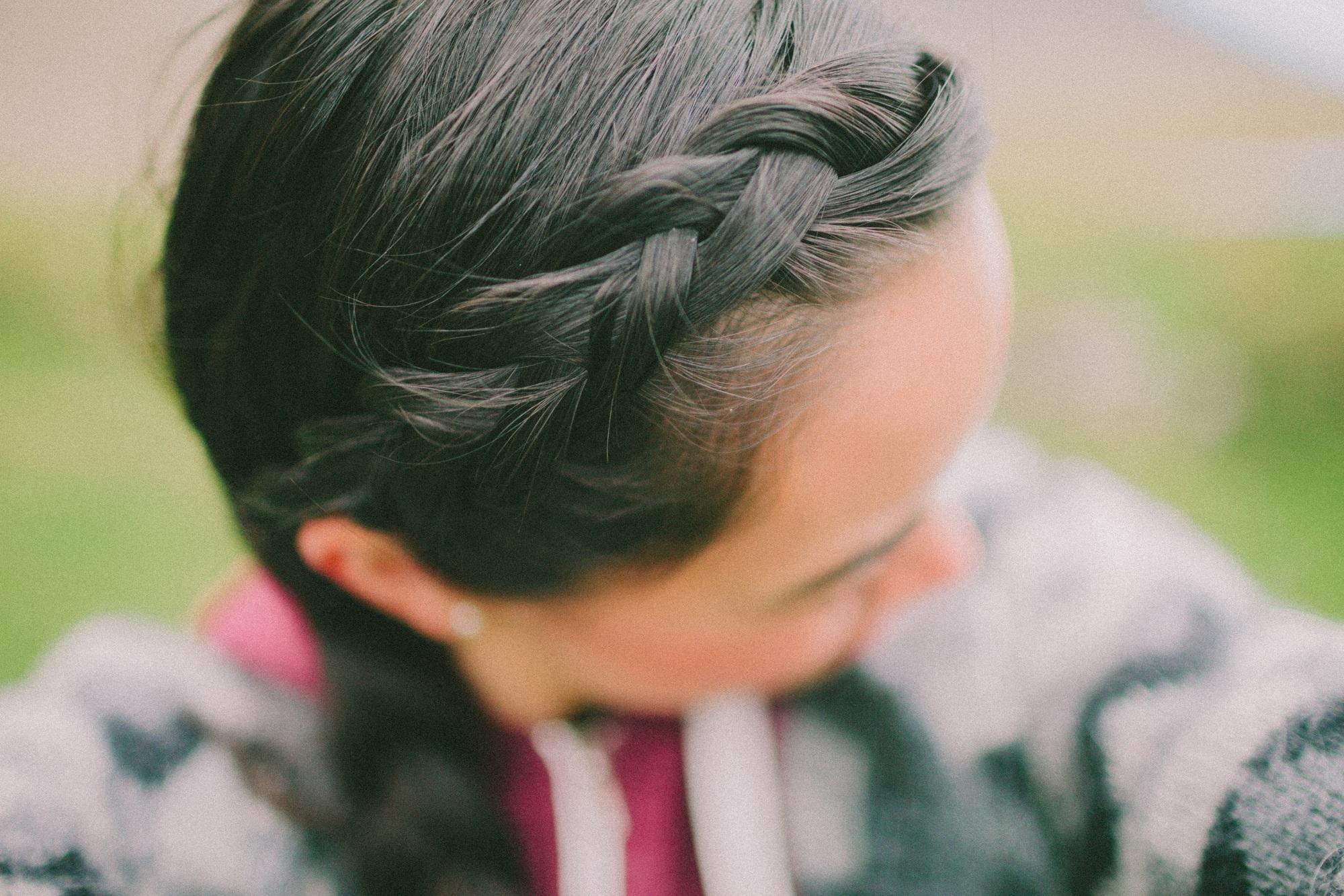 A woman with braided hair.